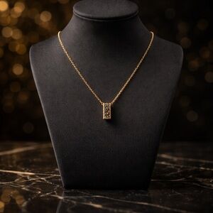 Black and Gold Toned Loop Pendant Necklace